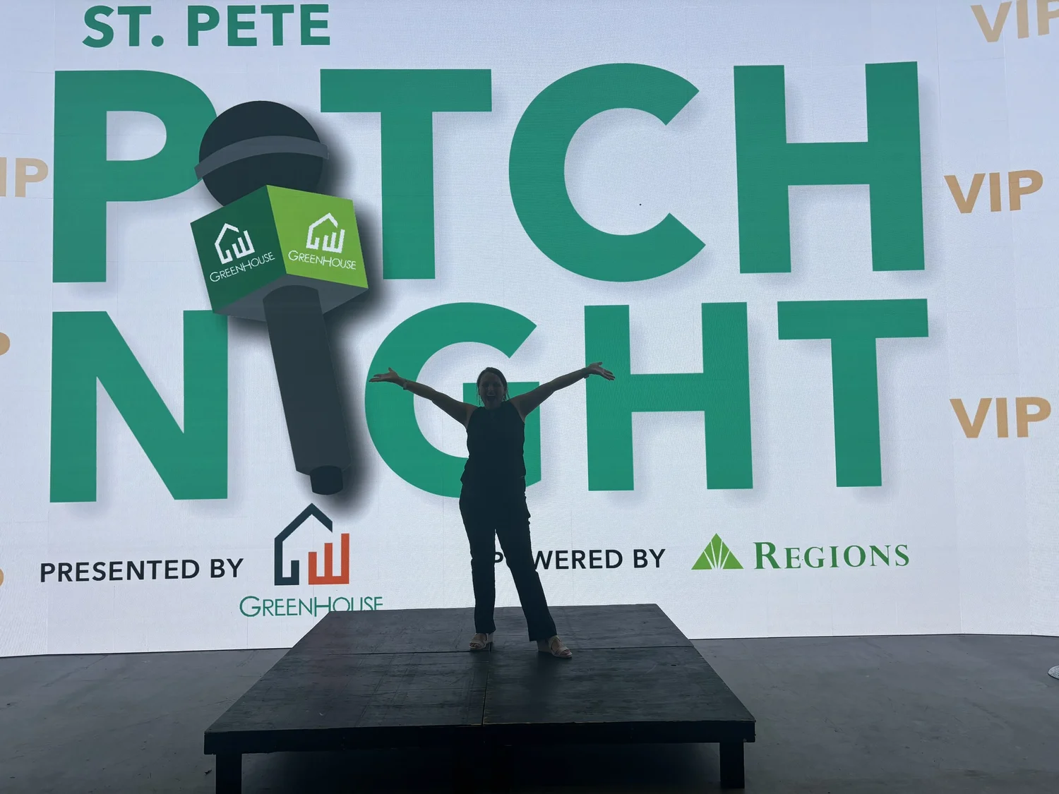 Hannah Morgan celebrating on stage at the St. Pete Rich List event